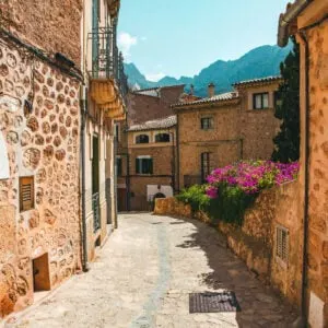 View of a medieval street in the Old Town of the picturesque Spanish-style village Fornalutx, Majorca