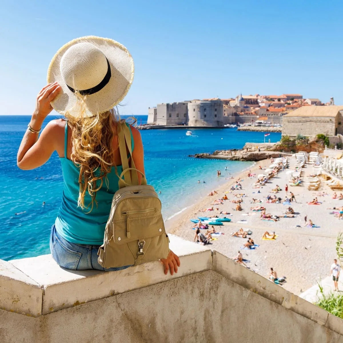 Young Woman Admiring A View Of Dubrovnik Old Town, Croatia
