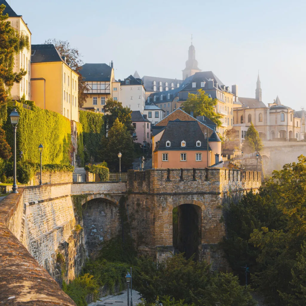 This Medieval City Is The Least Crowded Destination In Europe This Fall A cityscape of Luxembourg city in Luxembourg, Luxembourg City skyline during beautiful sunrise
