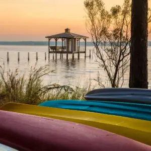 Colorful canoes on shore of Fairhope, Alabama