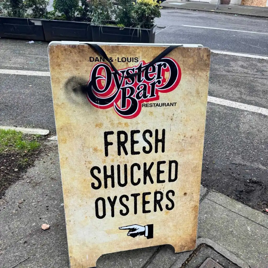 Dan & Louis fresh shucked oysters sign in Portland, Oregon