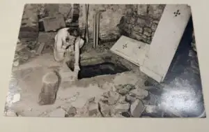 Ivan, owner of gallery in Cortona, discovering an ancient well in his gallery