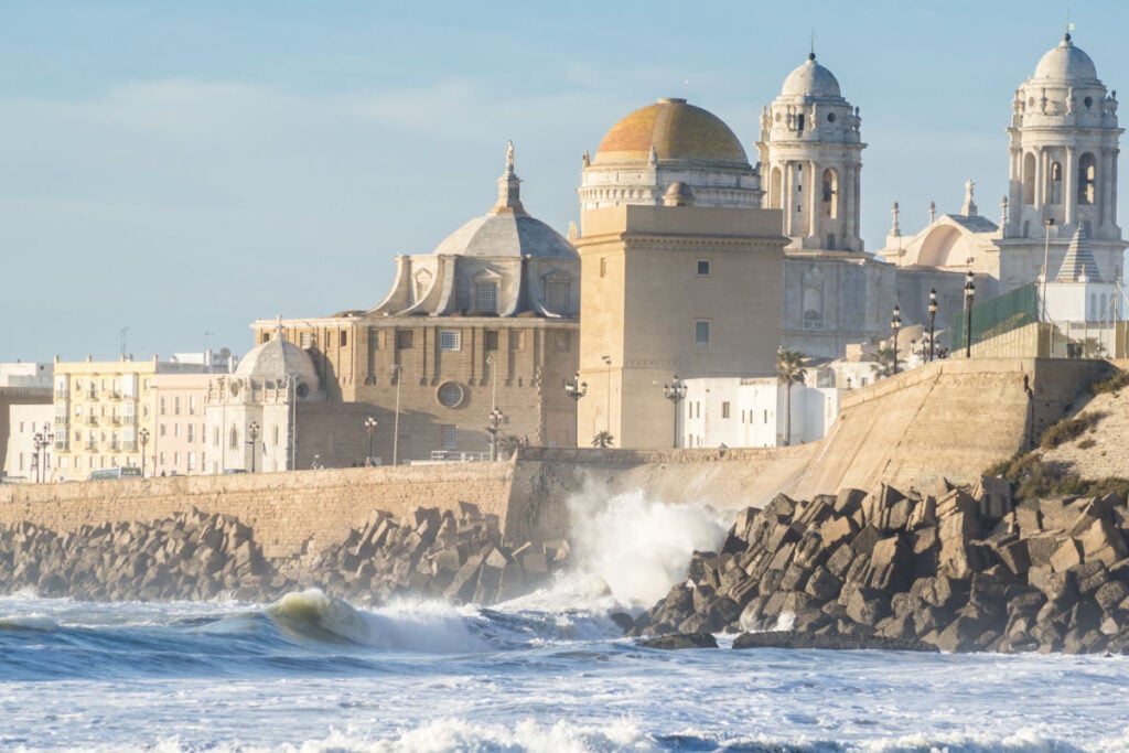 Waves crashing near Cadiz Cathedral (Spain)