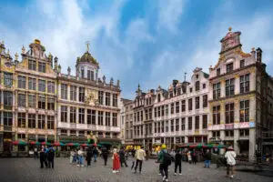 Tourists visiting vibrant plaza in Brussels, Belgium