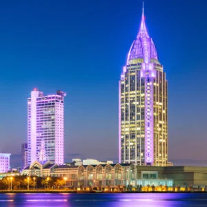 Mobile Alabama skyline at night overlooking river