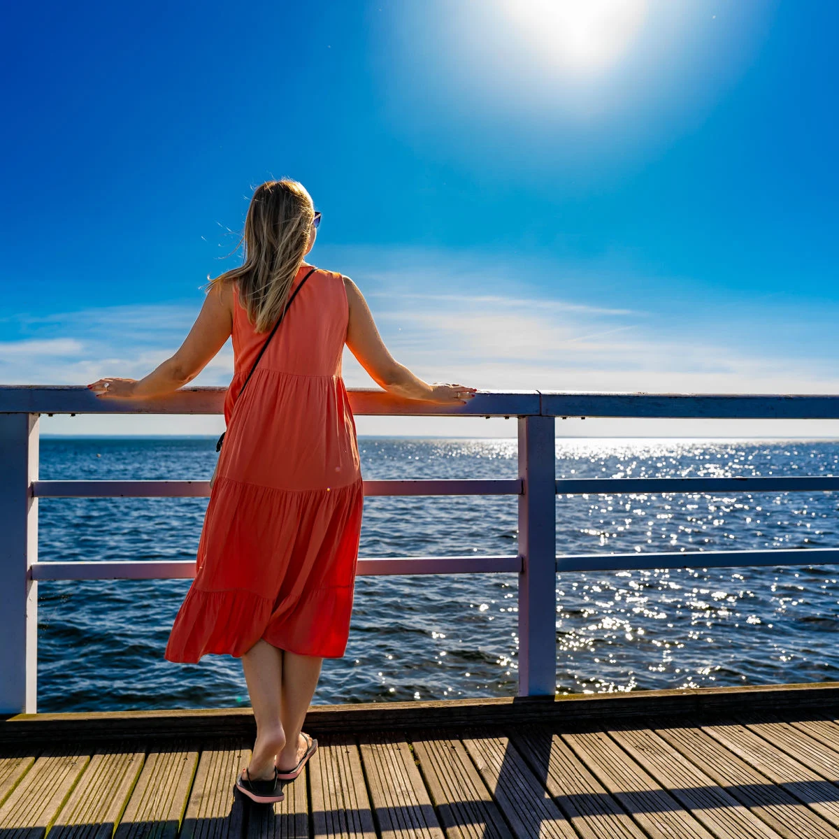 Woman enjoying sea views from cruise