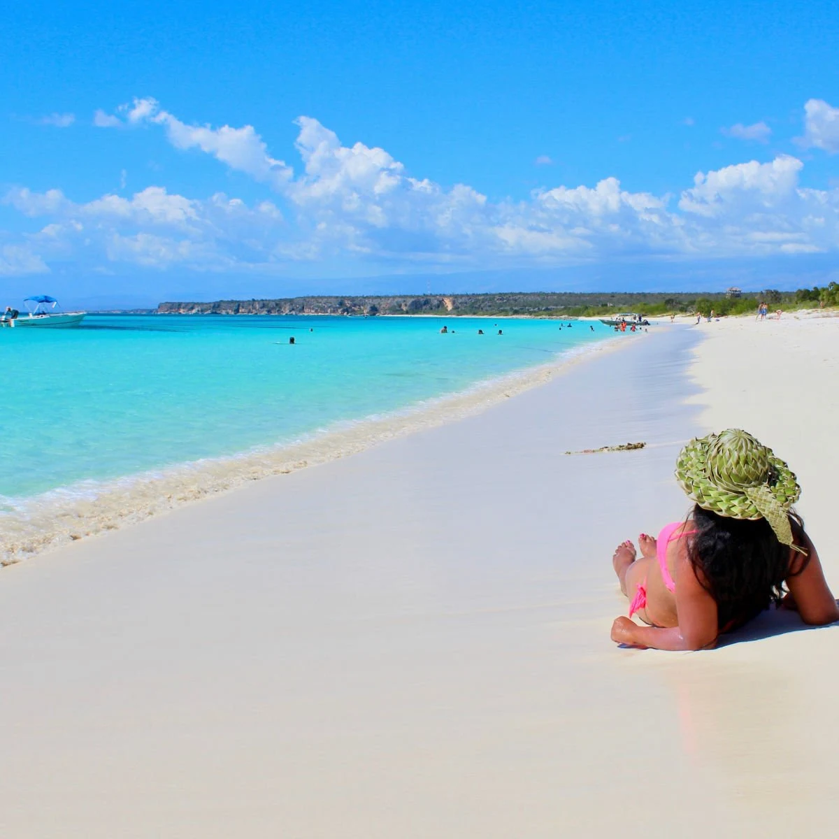 Woman relaxing in Bahia de las Aguilas near Cabo Rojo, Dominican Republic