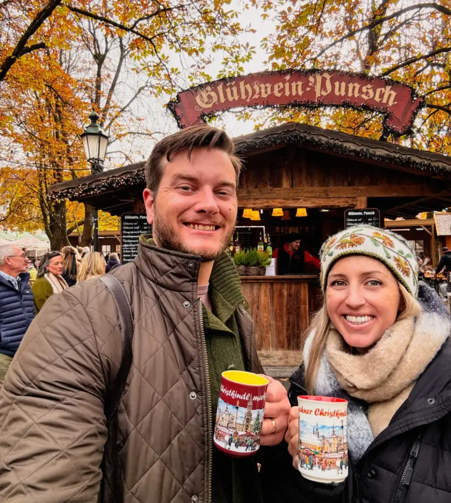 Man and woman drinking Glühwein in Germany in Munich