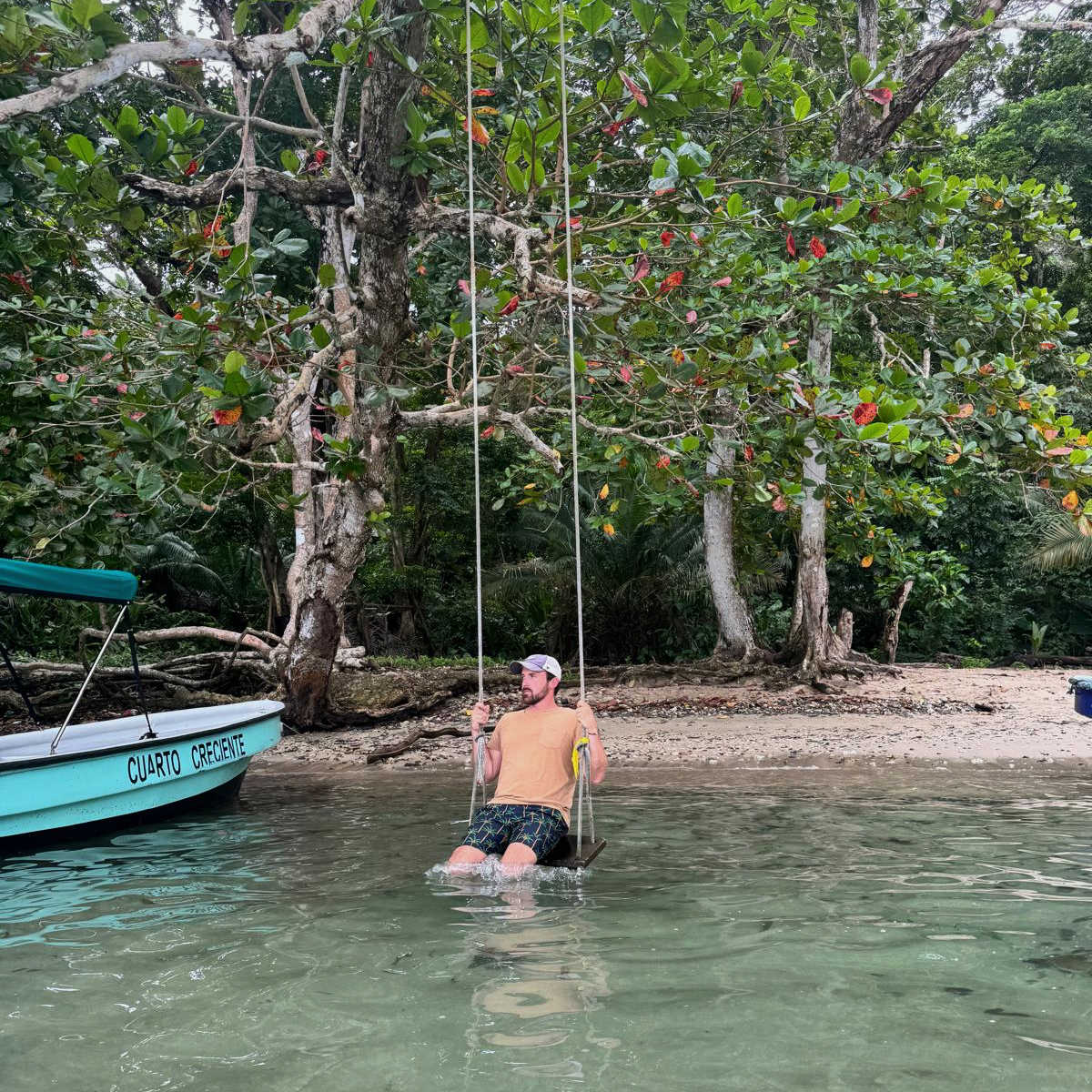Swinging in water in Portobelo, Panama