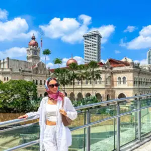 Woman visiting Sultan Abdul Samad Building in Kuala Lumpur, Malaysia