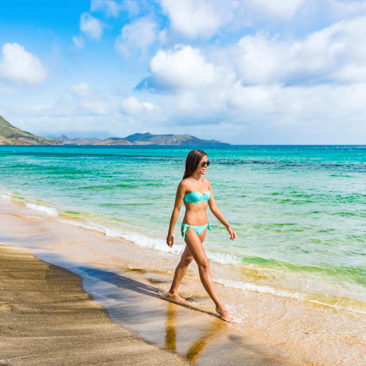 Young Woman In A Beach In Saint Kitts And Nevis, Caribbean Region