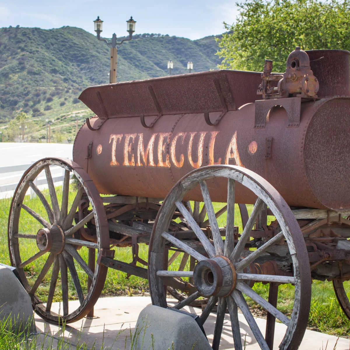A vintage iron tank antique ornament on the corner to the entrance to downtown Temecula
