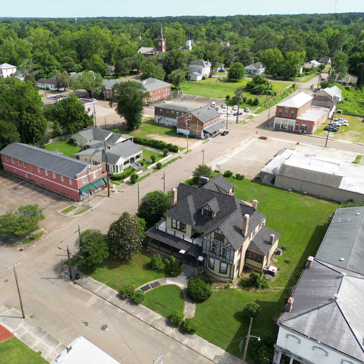 This Affordable Riverside Town Oozes Southern Charm & European Vibes Aerial view of Port Gibson, MS historic buildings