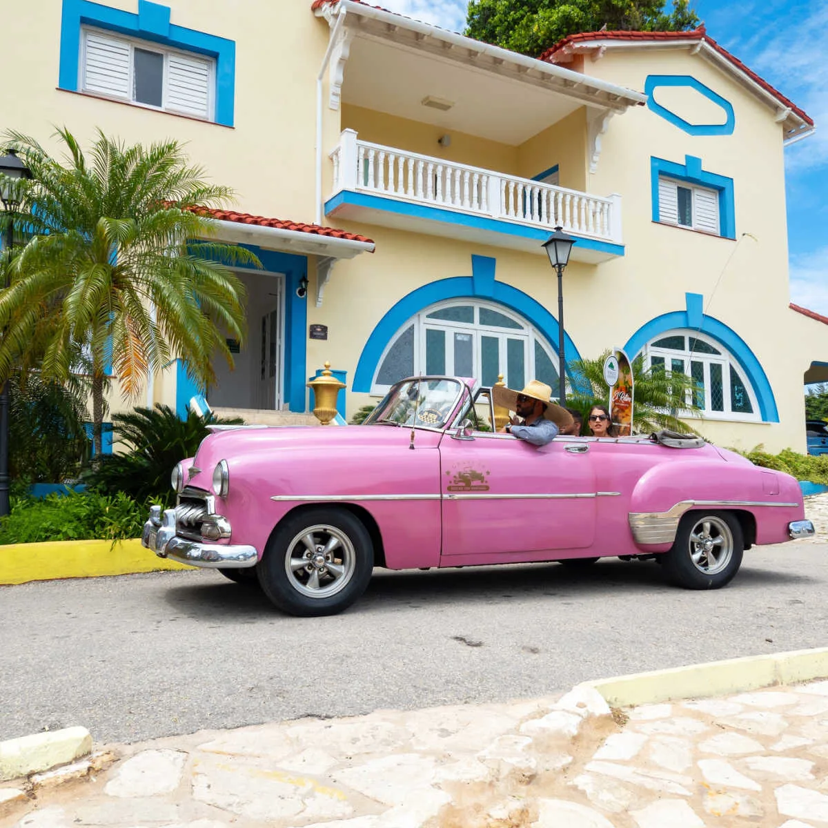 Classic pink car in Varadaro, Cuba