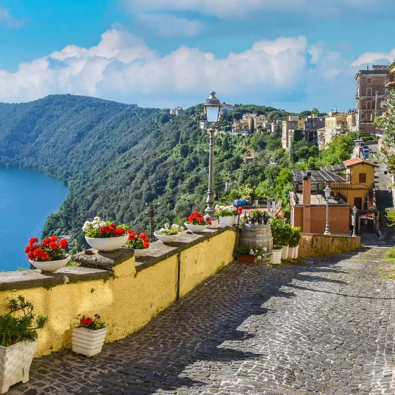 Cobbled Street Lining The Shores Of Lake Albano In Castel Gandolfo, Italy