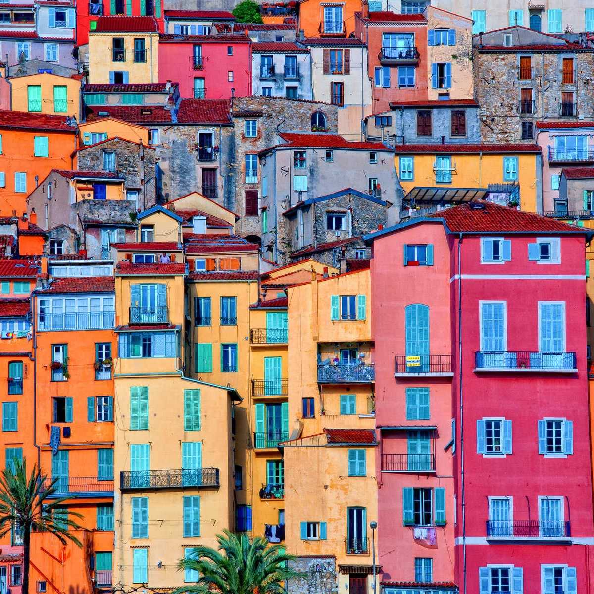 Colorful Houses Lining The Waterfront In Menton, France