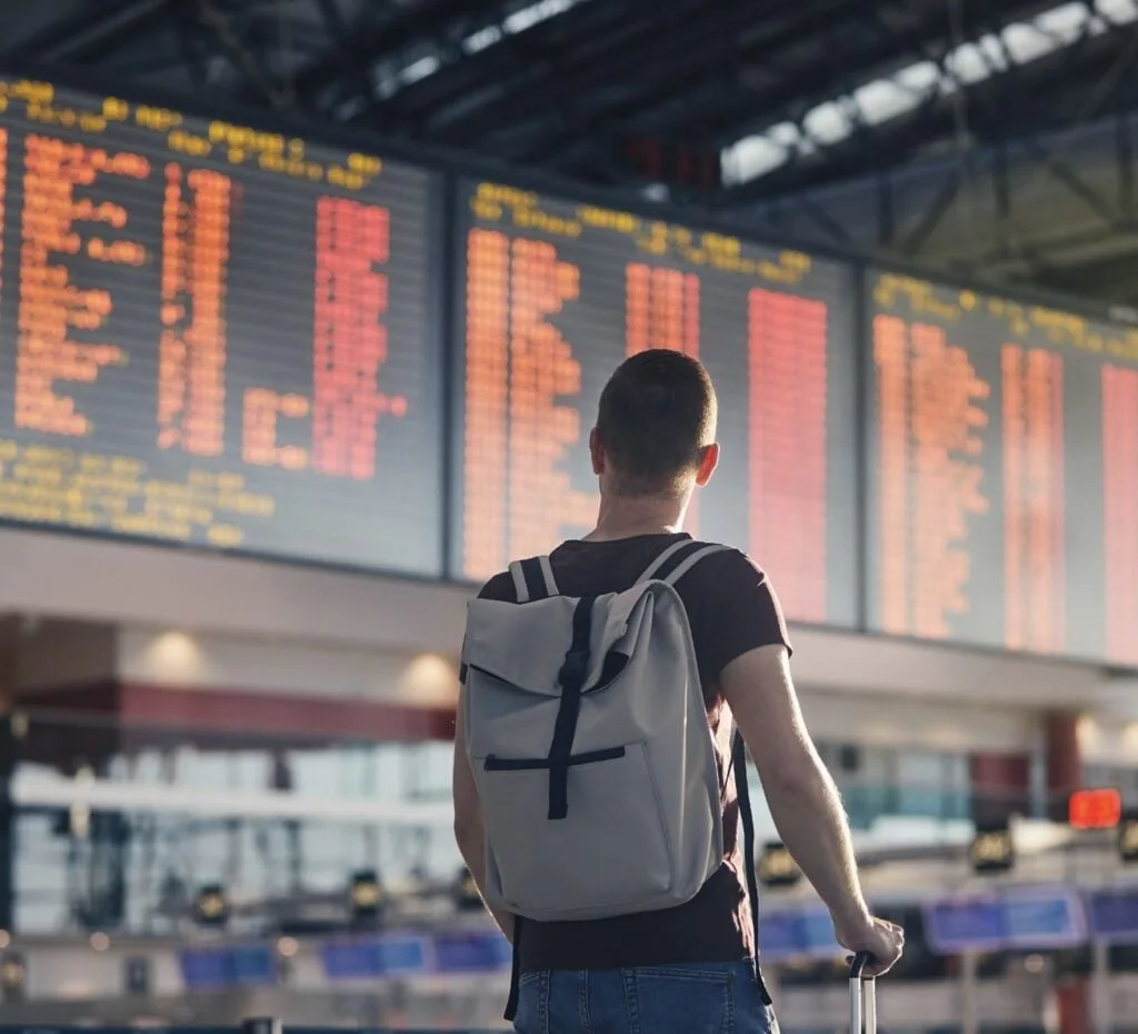 Cool and calm passenger check departure board