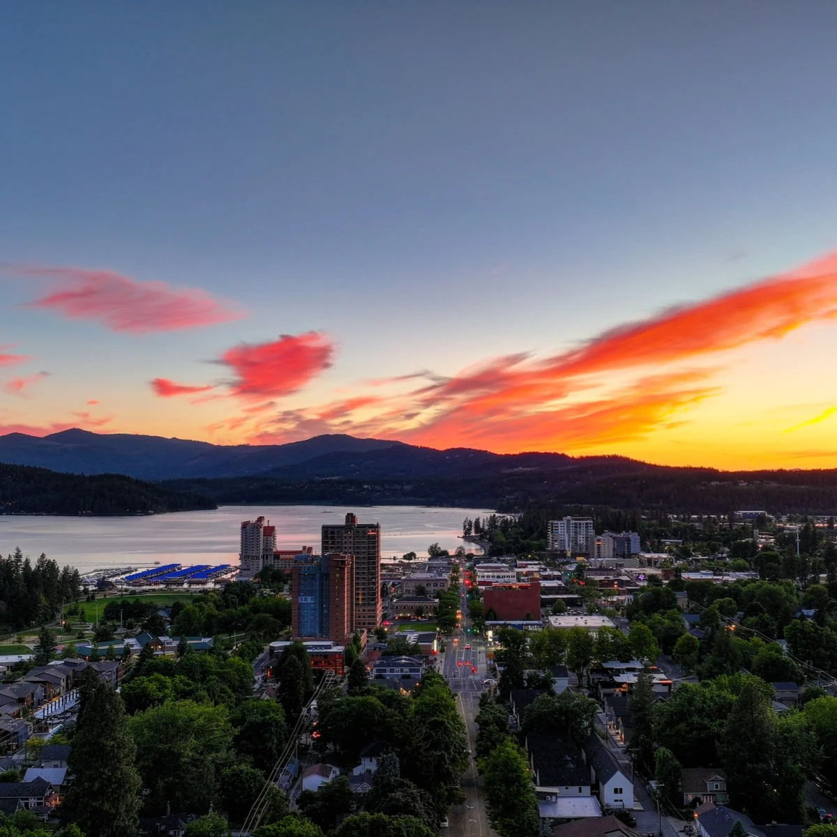 Posh Stays & Stunning Nature: Idaho's Postcard Lake Town Is Breaking Summer Tourism Records Fiery sky over Coeur d'Alene, ID