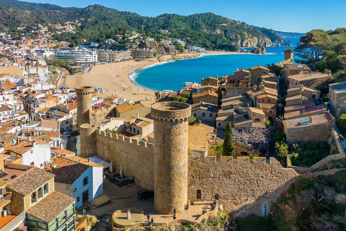 Forget Barcelona! These 4 Authentic Towns Less Than 2 Hours Away Are Less Crowded Panoramic View Of Tossa De Mar, Spain