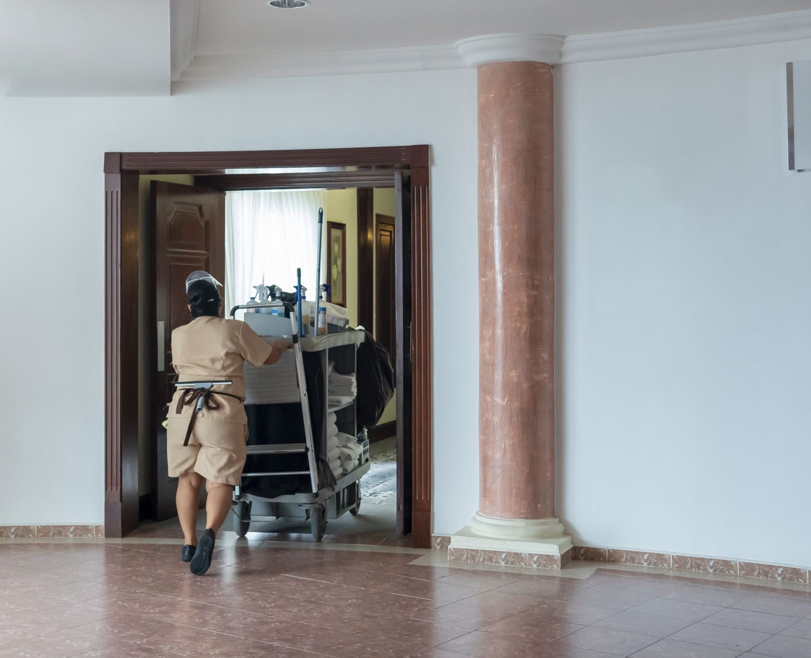 Housekeeping enters resort room for cleaning at Mexico resort