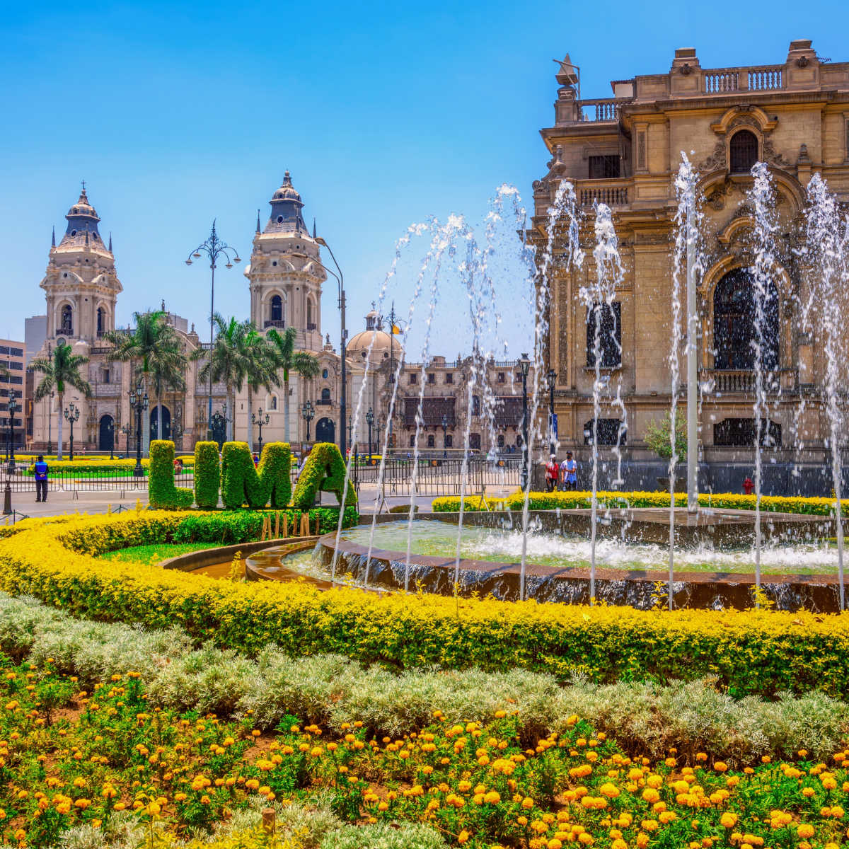Lima sign and fountain in front of cathedral in Peru