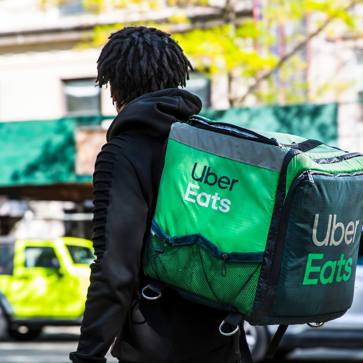 Man carrying Uber Eats thermal bag