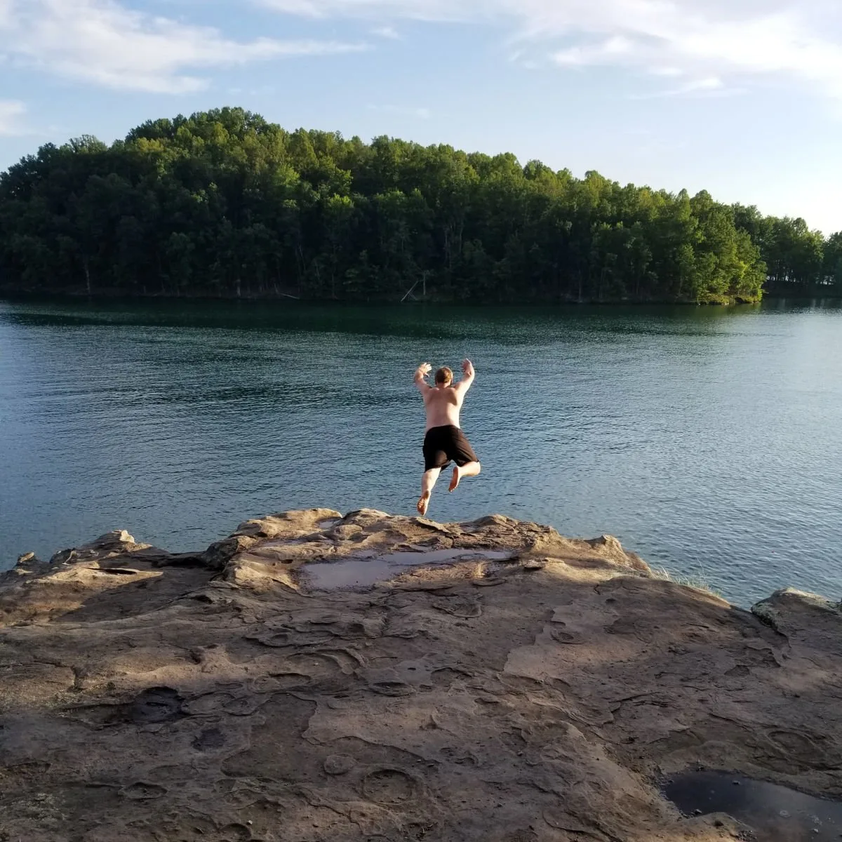 Man jumping into Summersville Lake, WV