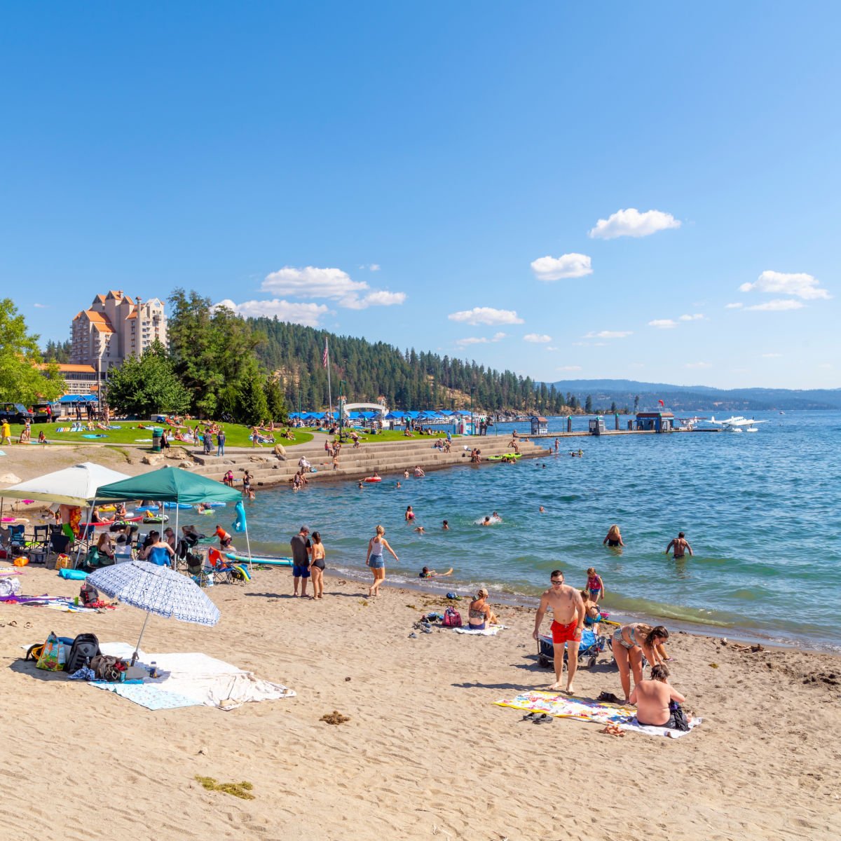 Posh Stays & Stunning Nature: Idaho's Postcard Lake Town Is Breaking Summer Tourism Records Nice beach in summer in Coeur d'Alene