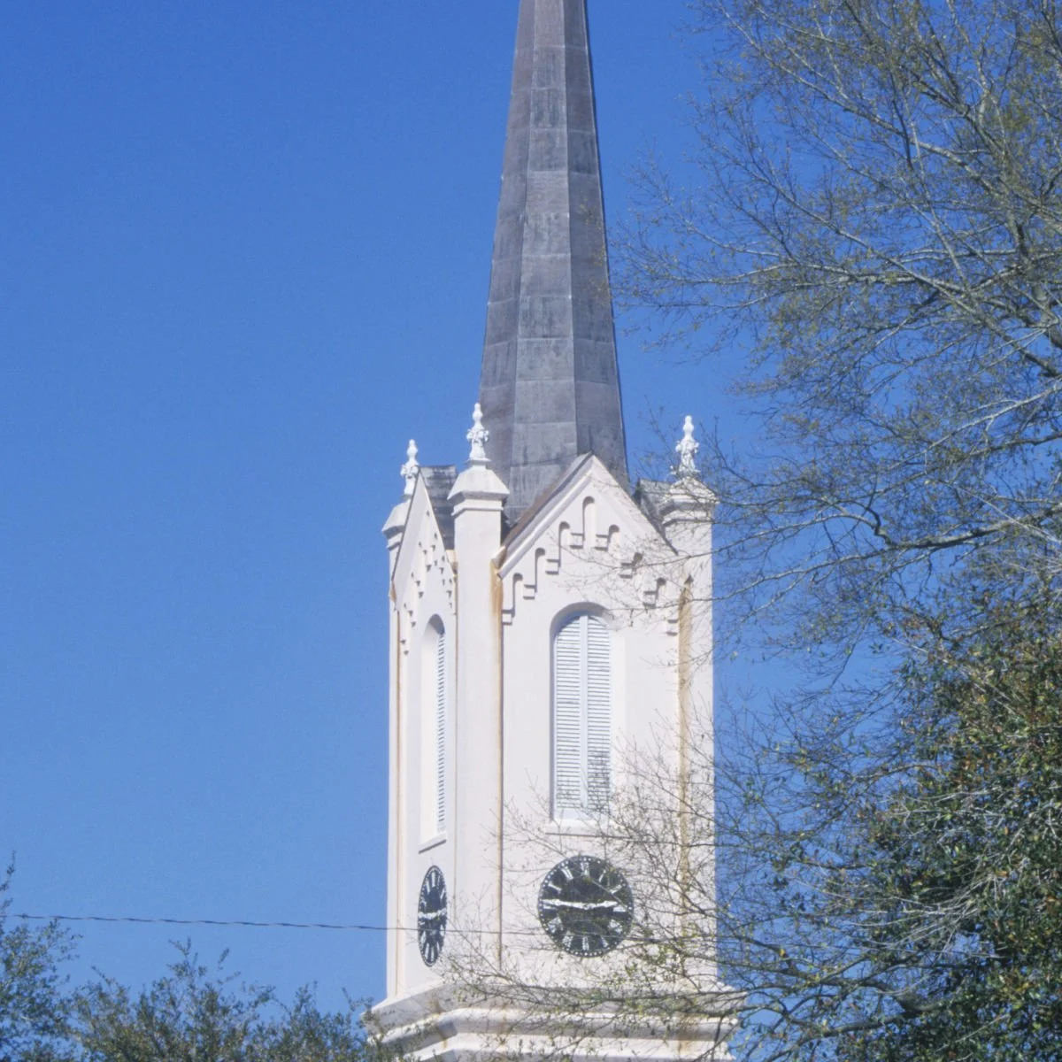 This Affordable Riverside Town Oozes Southern Charm & European Vibes Presbyterian steeple in Port Gibson, MS