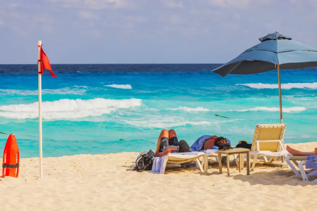 Cancun & Riviera Maya Declared Safe For Swimming After Nationwide Inspection Of 2300 Beaches Tourists-walkin-gon-beach-in-Playa.jpg