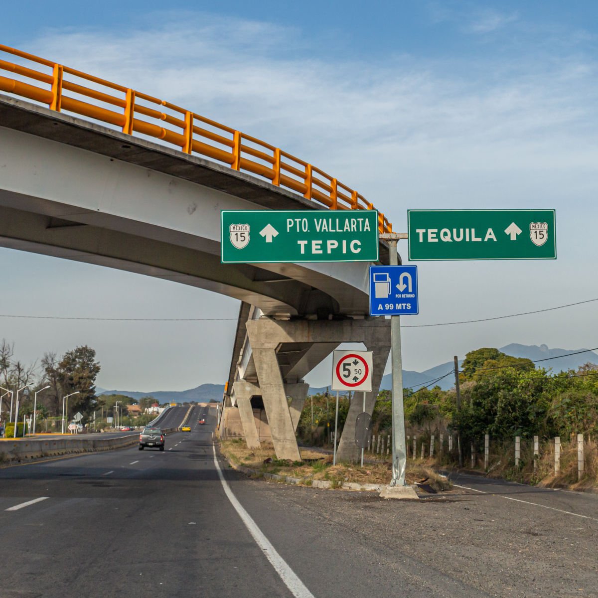 Road signs to Tepic, Puerto Vallarta, and Tequila in Mexico