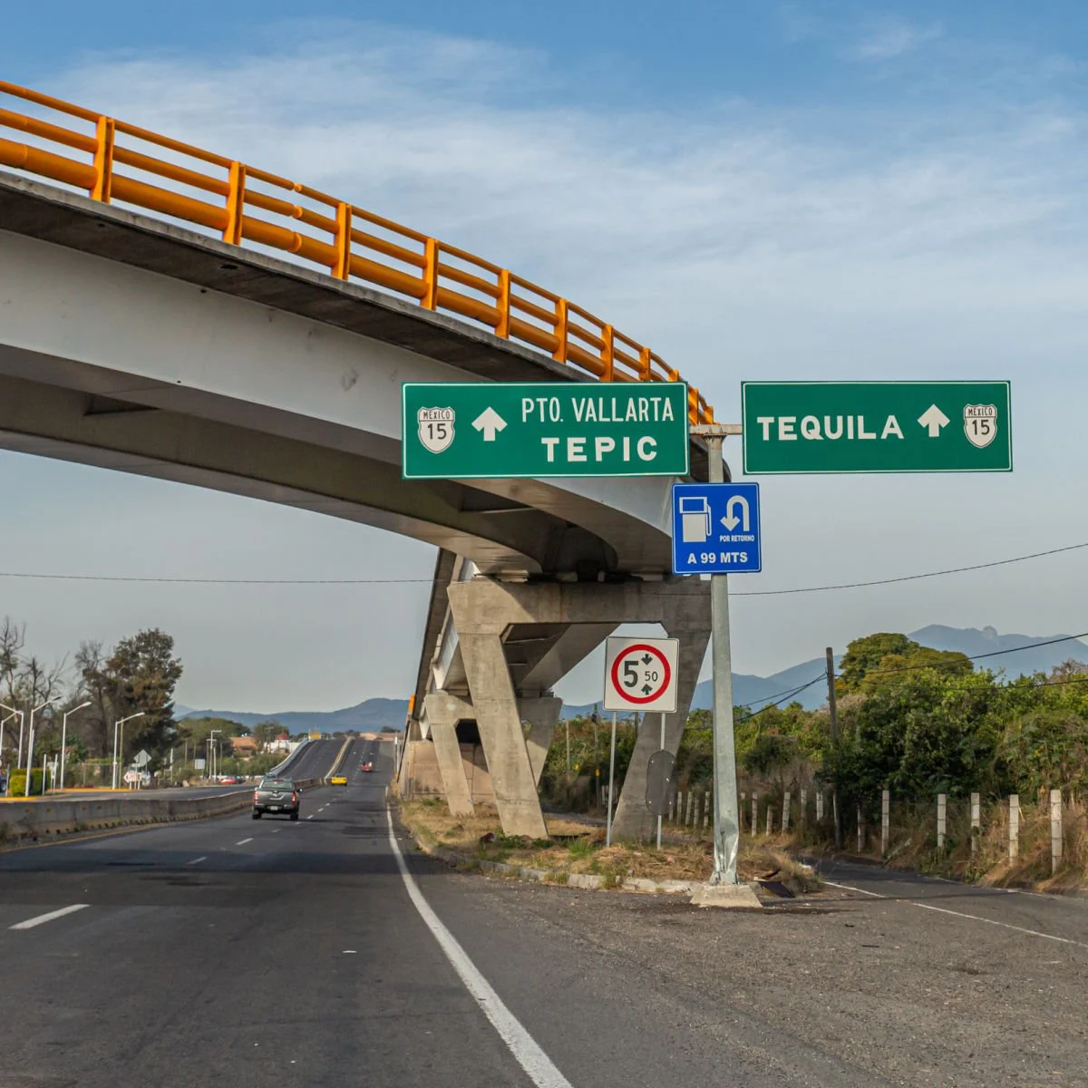 Road signs to Tepic, Puerto Vallarta, and Tequila in Mexico