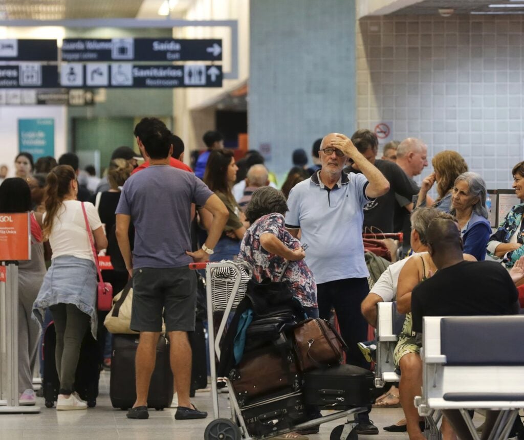 Stressed Passengers wait for delayed flight