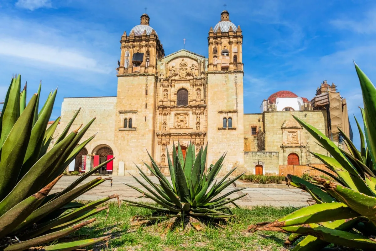 This Gorgeous Historic City In Mexico Offers Authentic Culture & Cheaper Prices The Church and convent of Santo Domingo de Guzman in Oaxaca, Mexico.
