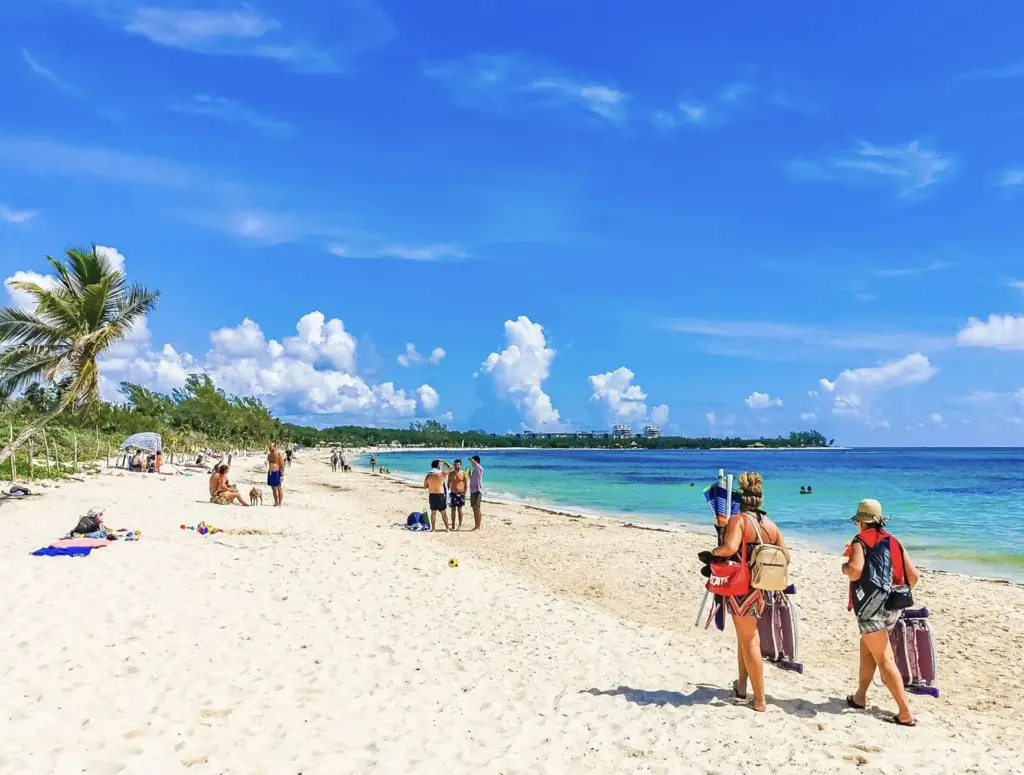 Cancun & Riviera Maya Declared Safe For Swimming After Nationwide Inspection Of 2300 Beaches Tourists-walkin-gon-beach-in-Playa.jpg