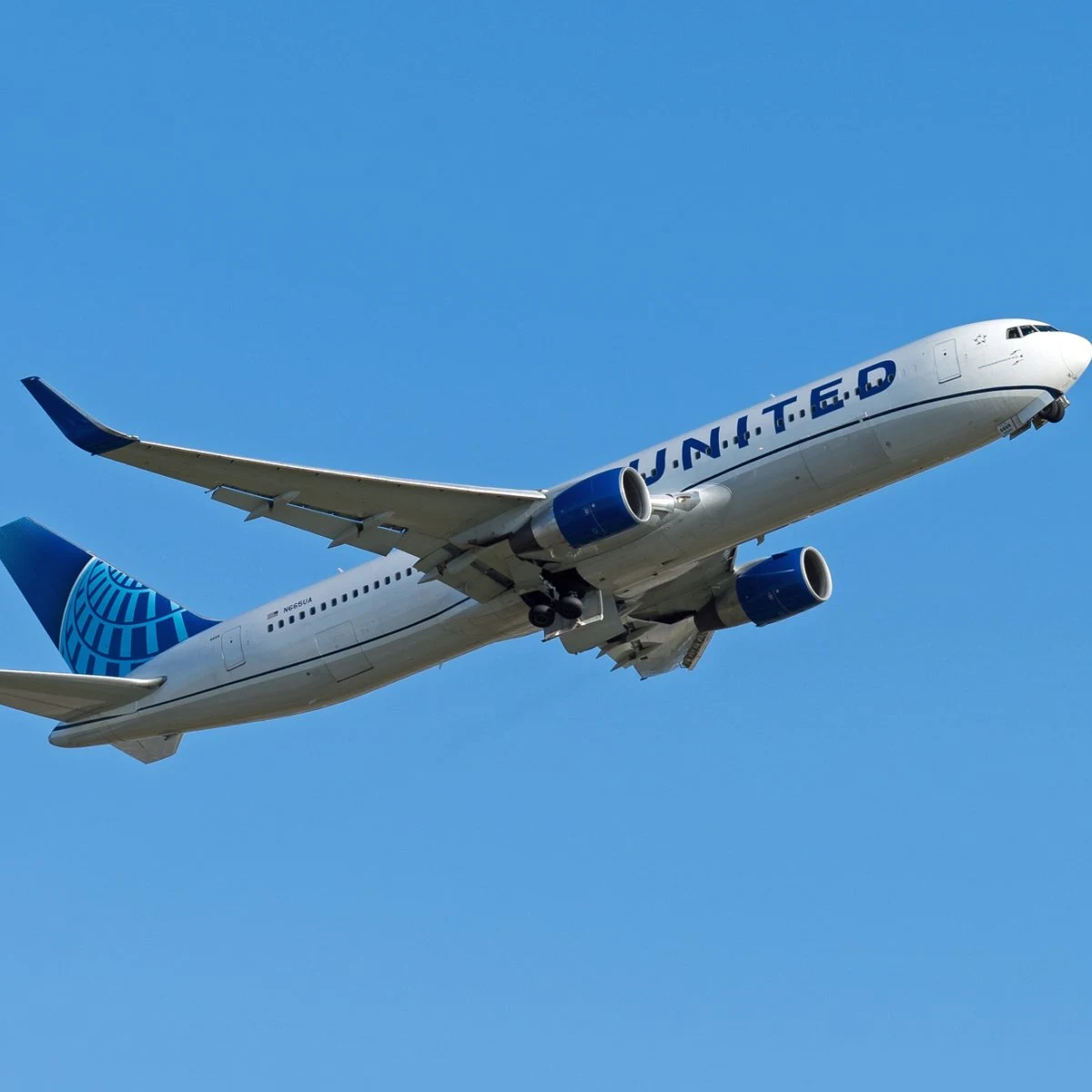United Airlines plane in sky