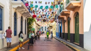 Hanging hats on vibrant Panama street