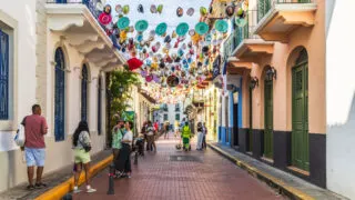 Hanging hats on vibrant Panama street