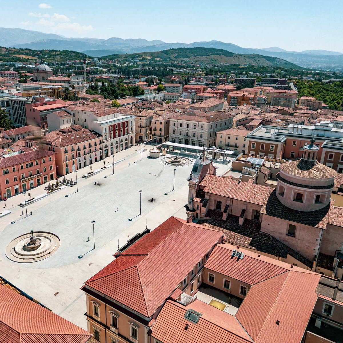 Move Over Rome: This Is The Top Cultural Destination In Italy For 2026 Aerial View Of L'Aquila, Italy