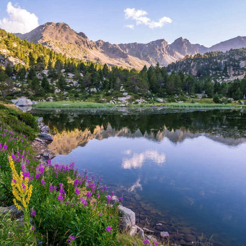 This Tiny Lesser-Known Country In Europe Wants More Tourists To Find It! Alpine Lake In Andorra