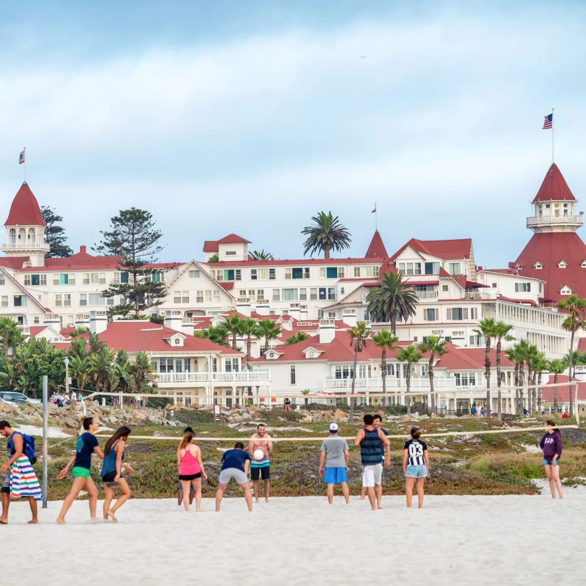 San Diego's White-Sand Paradise: Discover New Hotels & Vintage Charm This Summer Beach volleyball game at Hotel del Coronado