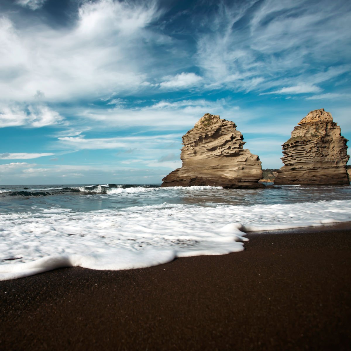 Black-sand  Ciraccio Beach in Procida