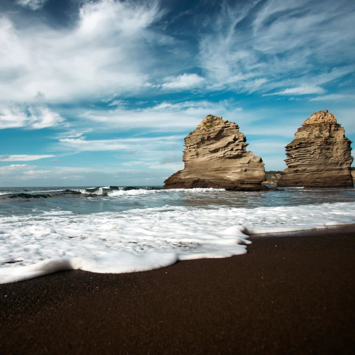 Black-sand  Ciraccio Beach in Procida