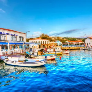 Boats docked at vibrant bozcaada, Turkiye waterfront