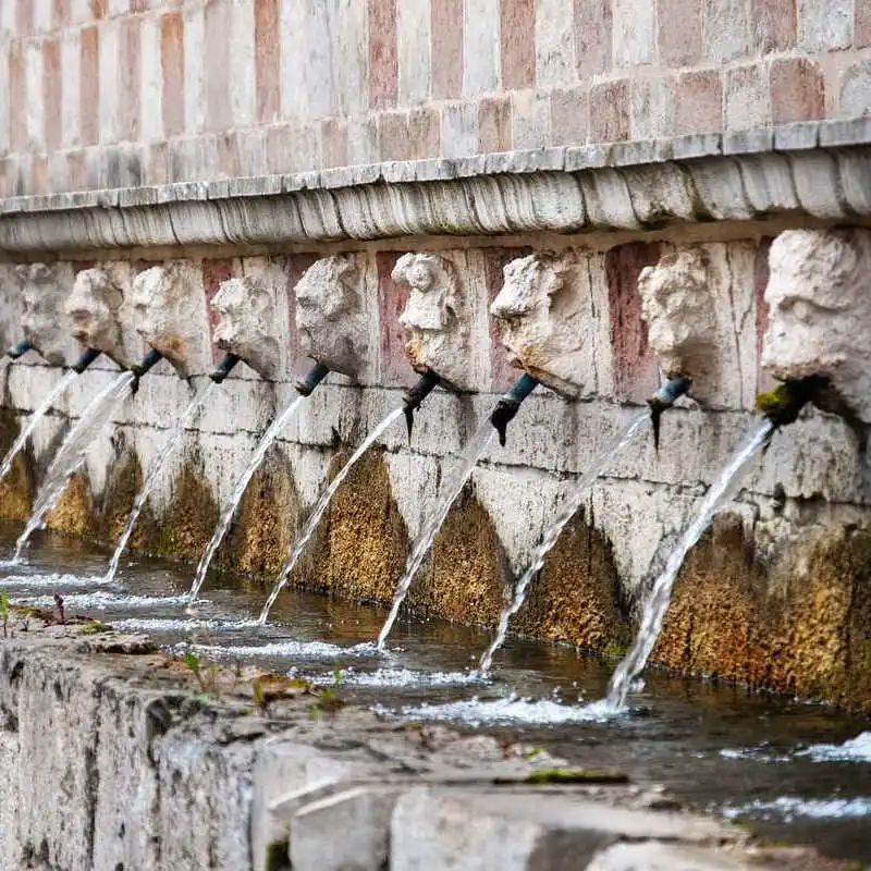 Move Over Rome: This Is The Top Cultural Destination In Italy For 2026 Historic Fountain In L'Aquila, Italy