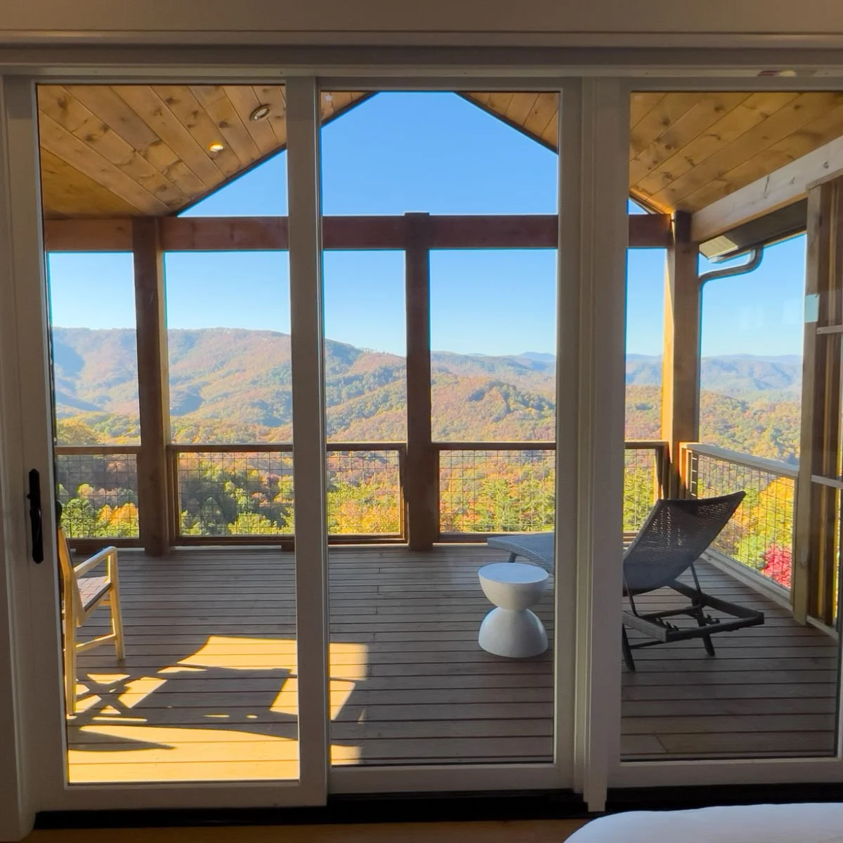 North Carolina's Next Hotspot Unveiled: Enjoy Less Crowds In This Rustic Mountain Town Hotel balcony with mountain view in Boone, NC