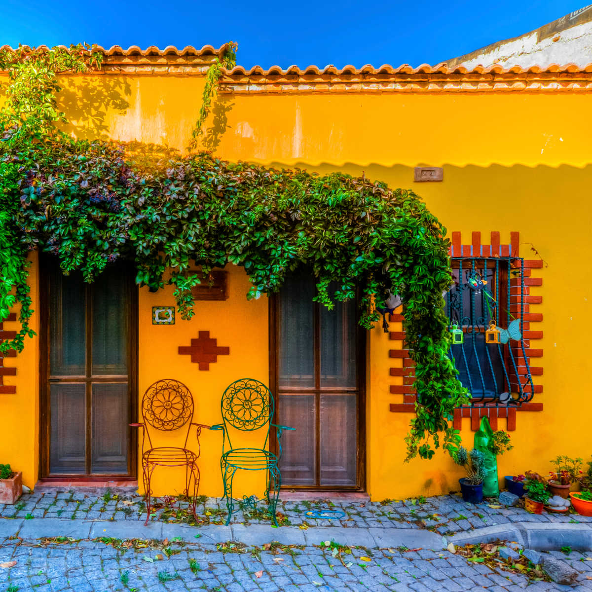 One of many colorful homes lining streets of Bozcaada