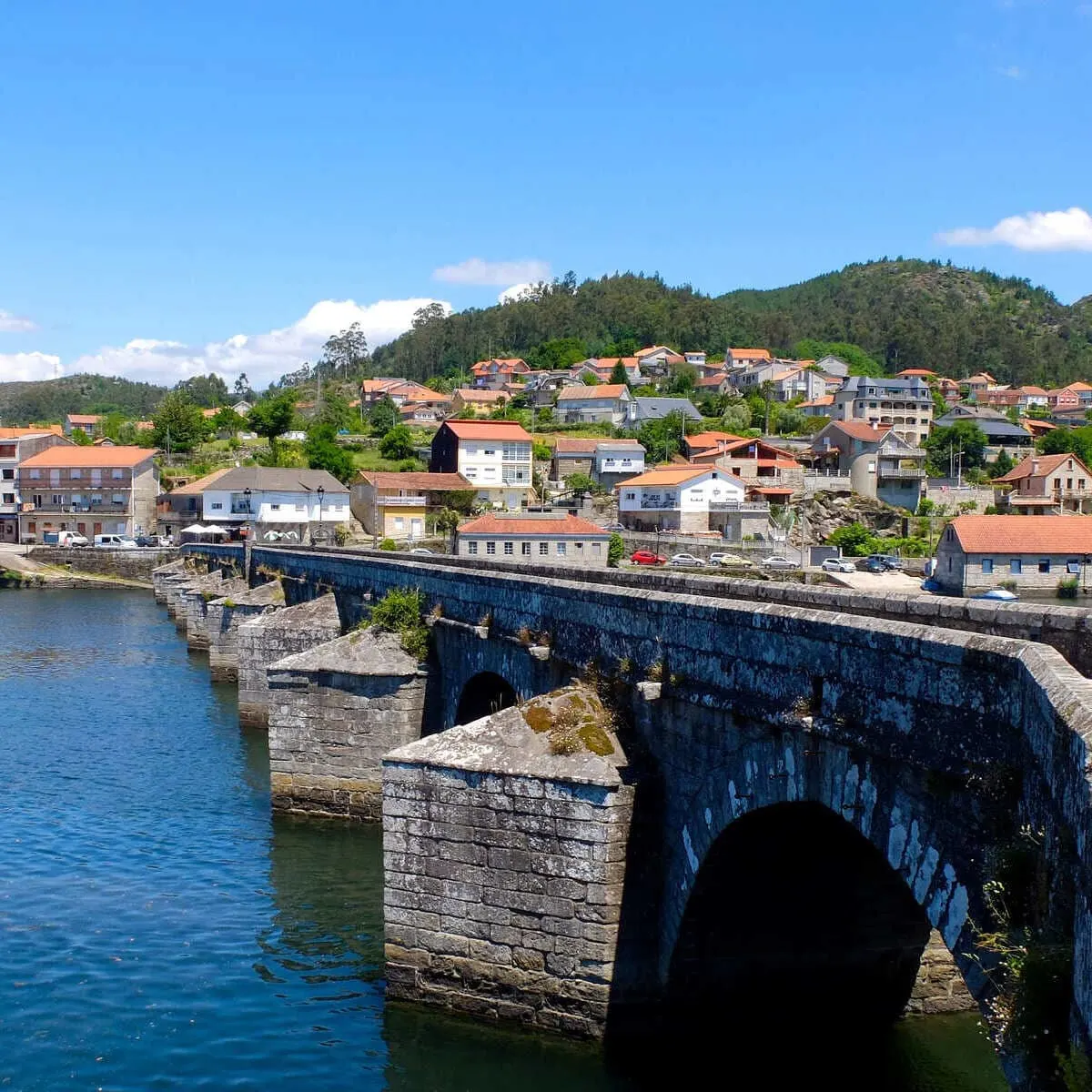 Why This Lesser-Known Medieval City In Spain Is Skyrocketing In Popularity Stone Bridge In Pontevedra, Spain