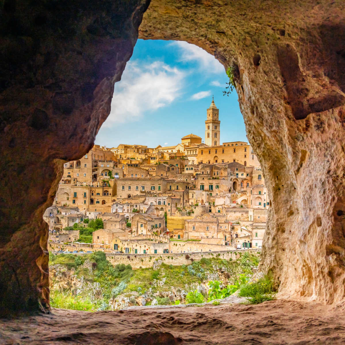 View of Matera cityscape through ancient cave