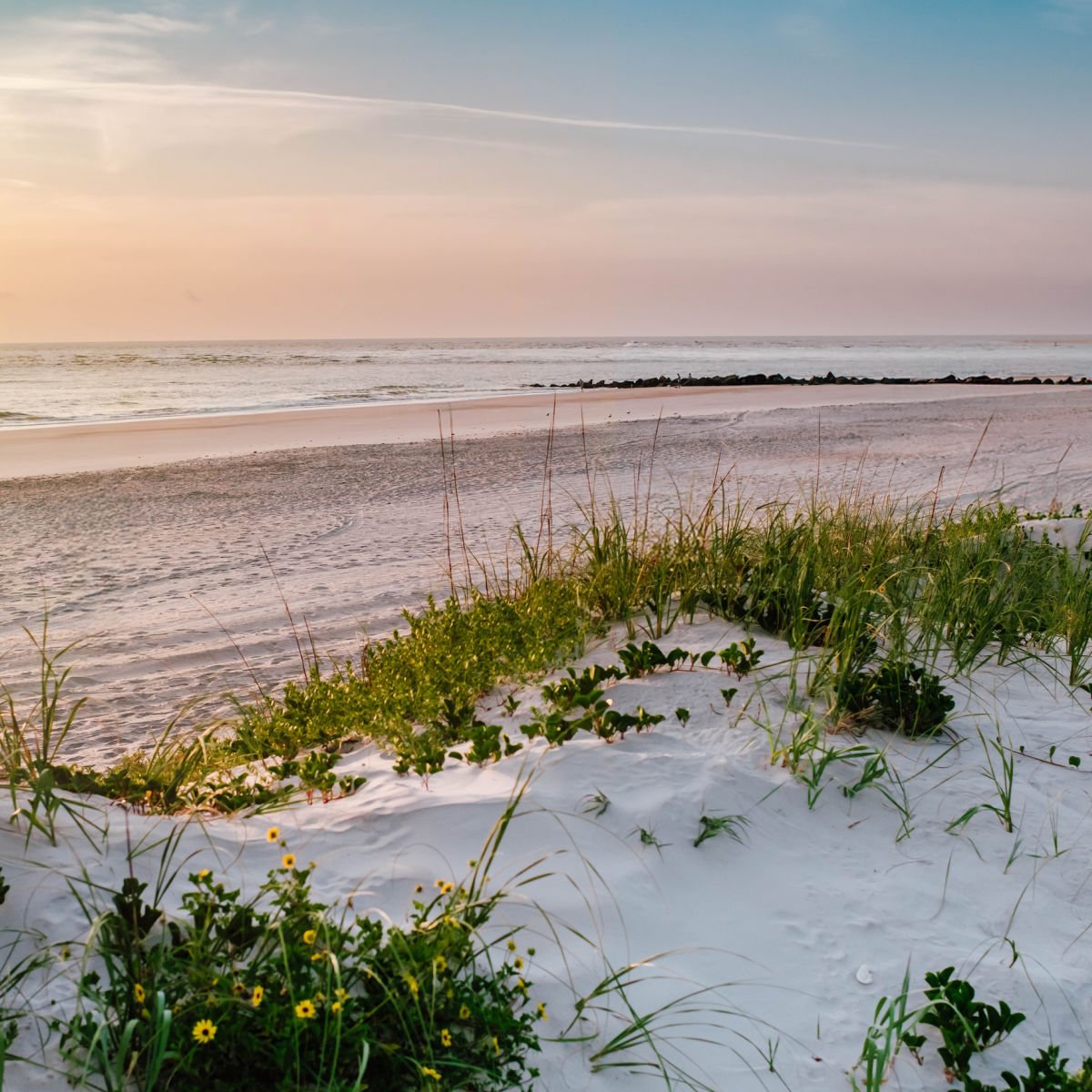 This Stunning Florida Hideaway Has A Beachside Castle & No Crowds White sand dunes in Vilano Beach, FL